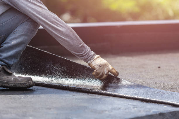 Professional Basement Waterproofing technician working in Dalton, OH